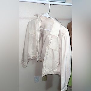 A light tan/ cream colored jacket from Sadie and Sage. This is a Medium size.